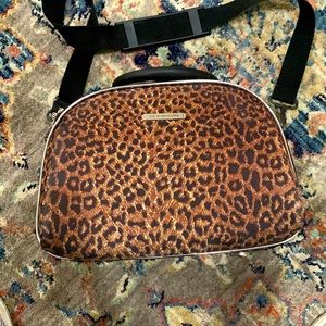 Luca Vergani leopard print carry on makeup case
